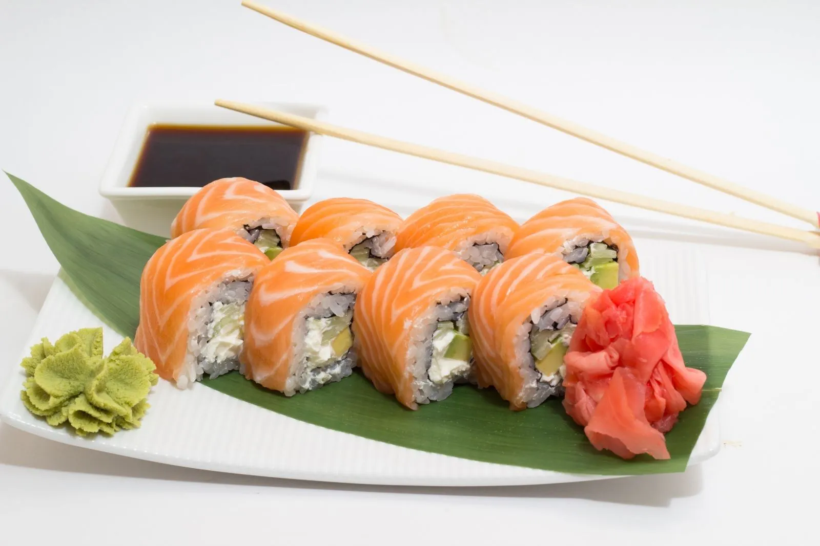 Salmon sushi roll with cream cheese and avocado at AYCE Bar & Wok, an Asian Fusion Restauran in Wind Gap